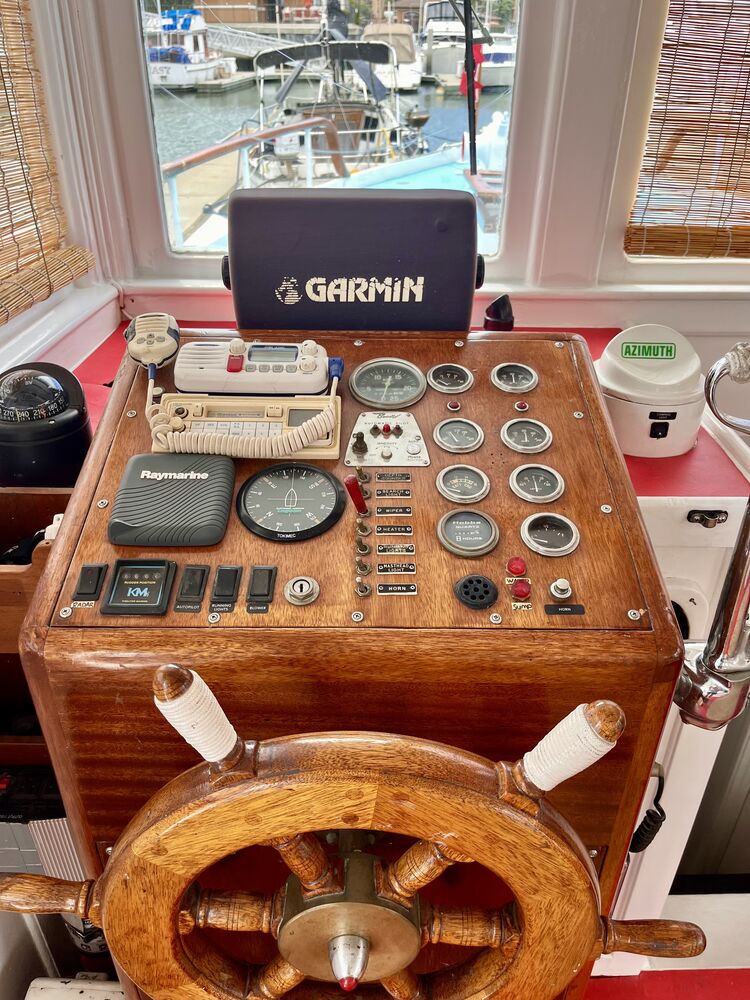 The wheelhouse helm and navigation station.